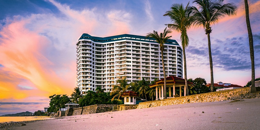 Idyllic snap of a beach side hotel surrounded by the scenic landscape near Visakha Museum