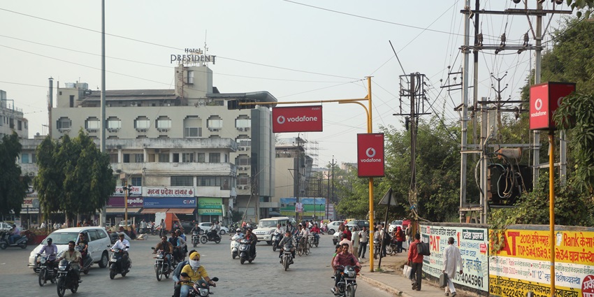 View of Hotel President in Indore, featuring the building's modern design and entrance.