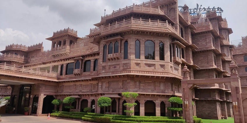 Cozy hotel room with modern amenities, perfect for guests visiting Achalgarh Fort.