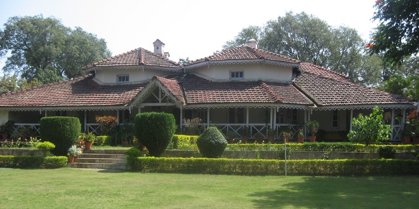 The Satpura Hotel, surrounded by beautiful gardens and vibrant flowerbeds
