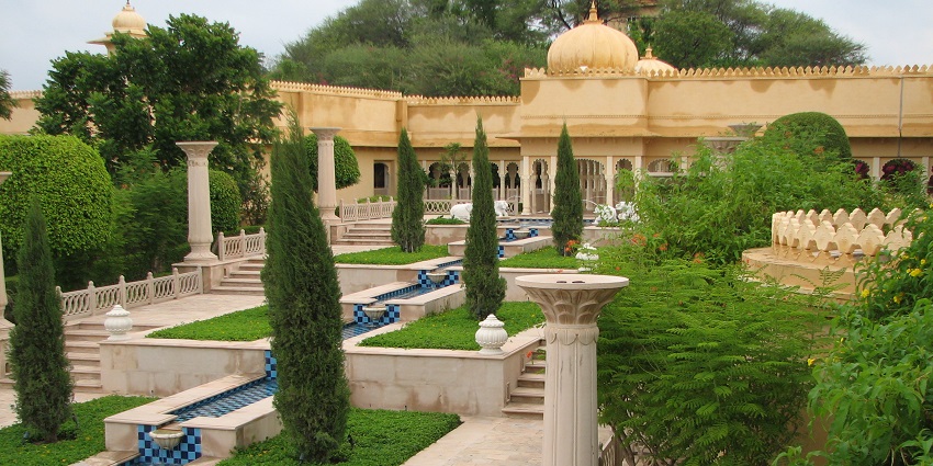 Lush gardens at Oberoi Udaivilas, popular accommodation near Haldighati Fort