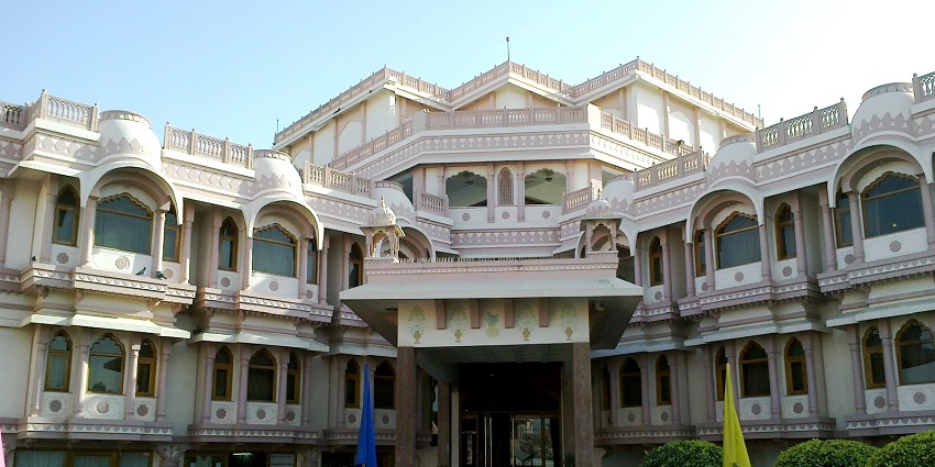 View of the entrance of a grand hotel nearby offering luxurious facilities