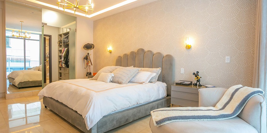 A view of a luxury hotel room with modern amenities near Rajkot Zoo for all to visit.