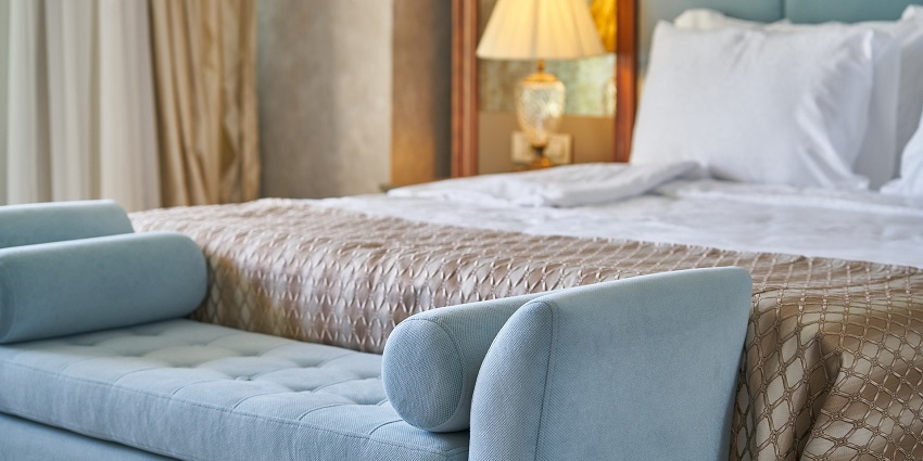 A picture of a hotel room with all the basic amenities, located near the Shikhar Adventure park