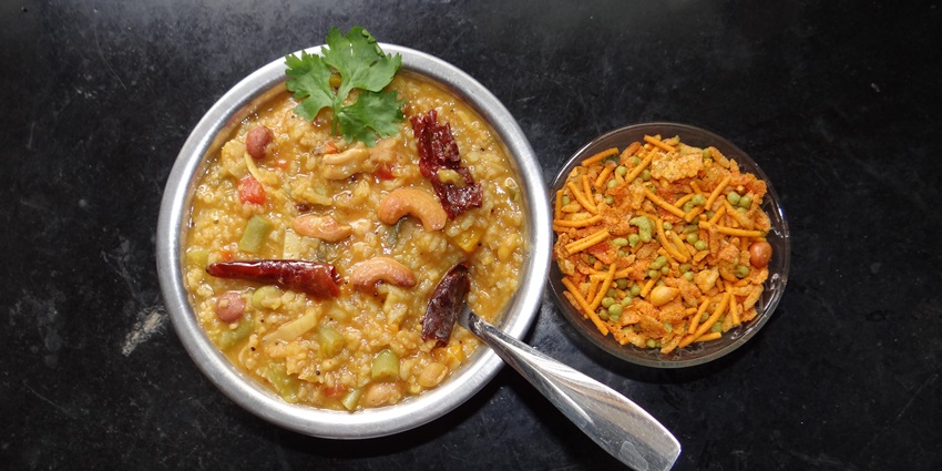 The traditional meal, bisibelebath is made of rice, lentils, and other vegetables