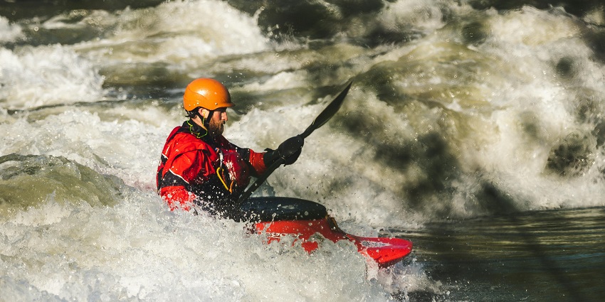 Rafters navigating thrilling rapids and enjoying the best adventure sports in Nepal.