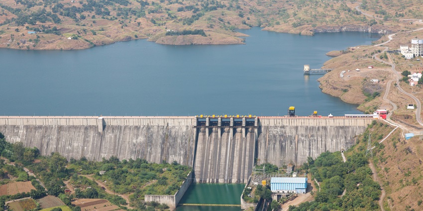 A glimpse of Wilson Dam offering scenic views, picnic spots, and fishing by Arthur Lake.
