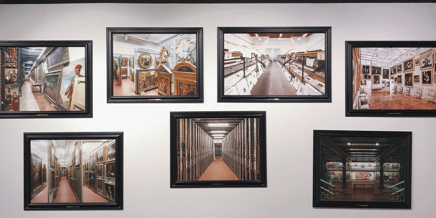 A picture of a woman admiring the astonishing art on display at an art gallery in Rajahmundry