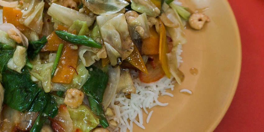 A plate of steamed vegetable rice served in Yellow Chilli, highlighting some of the best food in Bhuj.