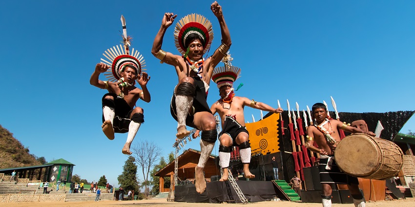 Image of Zeliang Naga Tribesmen of Nagaland performing during the Hornbill festival.
