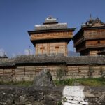 The exterior of the temple has intricate carvings and ancient architecture.