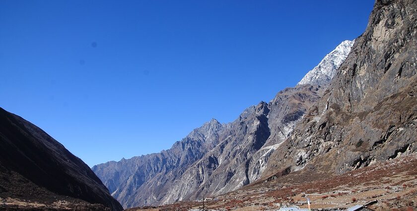 A scenic view of Langtang National Park amidst lush snow-capped valleys in Nepal