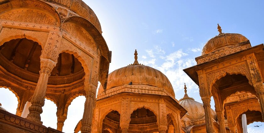 Image of Jaisalmer - explore the War Museum features a red archway, military decorations