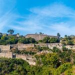 An image of spooky ruins of haunted Kangra Fort near Palampur and Dharamsala, India.