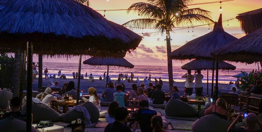 View of a vibrant beachside restaurant at sunset, offering into a glimpse of night life in north Goa