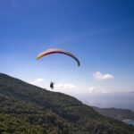 Paragliding in Mount Abu offers stunning views of hills and lakes to all travellers.