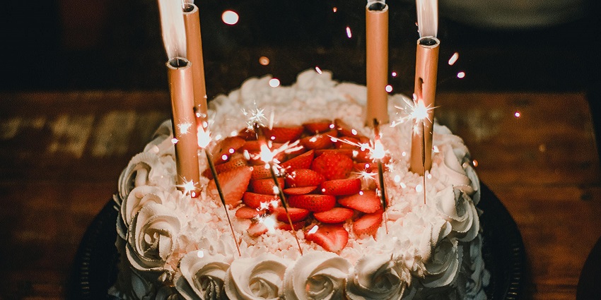 A beautiful cake for a birthday celebration on the 13th Floor with spectacular city views.