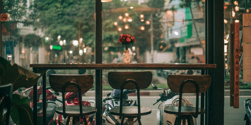 Cosy image of the stools by the window looking outside at 18 Degrees