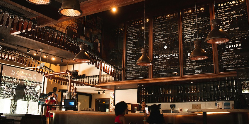Menu on the wall for customers at a cafe in Connaught place nightlife