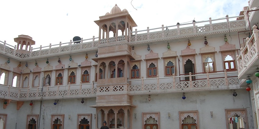 The Aai Mata ji Temple exterior view made of white marble near Naneghat Caves.