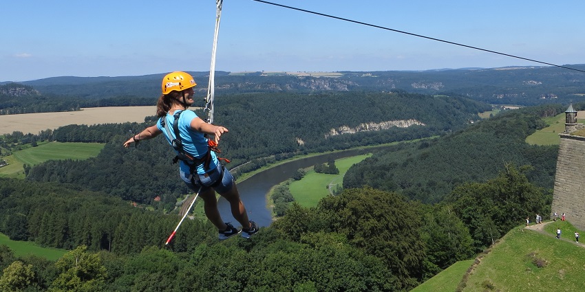 An adventure freak enjoying ziplining at Aamby Valley Adventure Park - things to do in Aamby valley