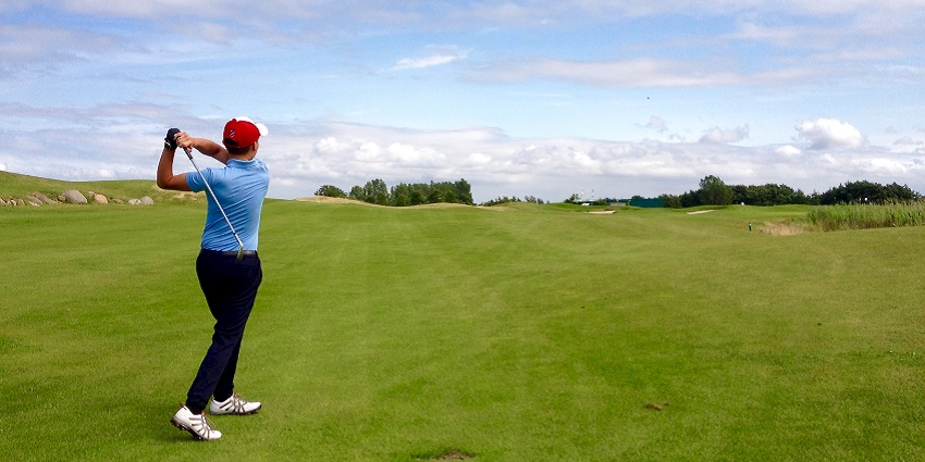 Golfer enjoying golf session at the Golf Course, one of the best things to do in Aamby Valley