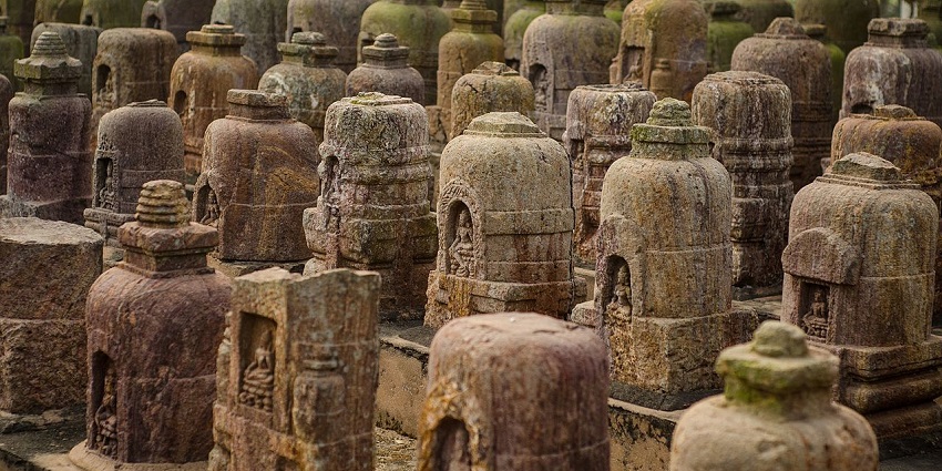 A side view of several ancient stupas made by carving rocks found at Ratnagiri Caves
Viewers of this file can see comments and suggestions