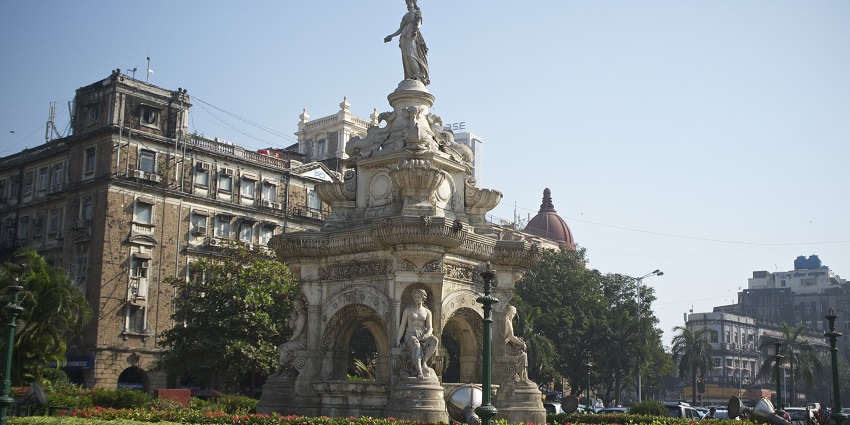 Flora Fountain, the historic landmark featuring a Roman goddess, surrounded by architecture.