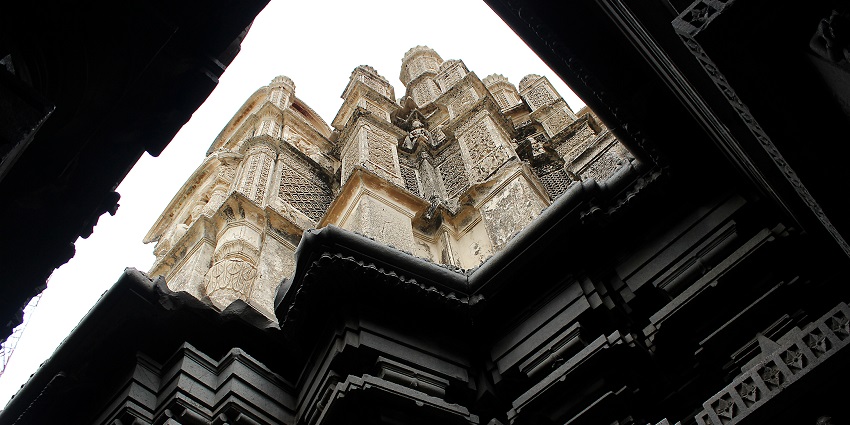 The interior of Bhuleshwar Temple in Malsiras, showcasing intricate carvings and design.