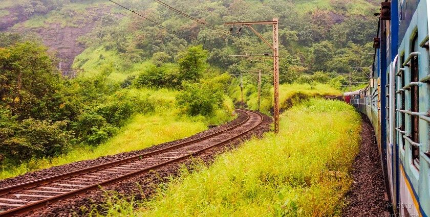 A wide view of Betwade Gaon with green fields in Thane.