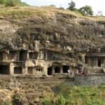 Agashiv Cave, a remarkable tourist attraction near Maharashtra, featuring stunning carvings