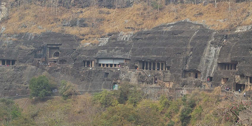 View of Ajanta Caves showcasing rock-cut Buddhist monasteries, one of the famous places near Waghora Waterfall