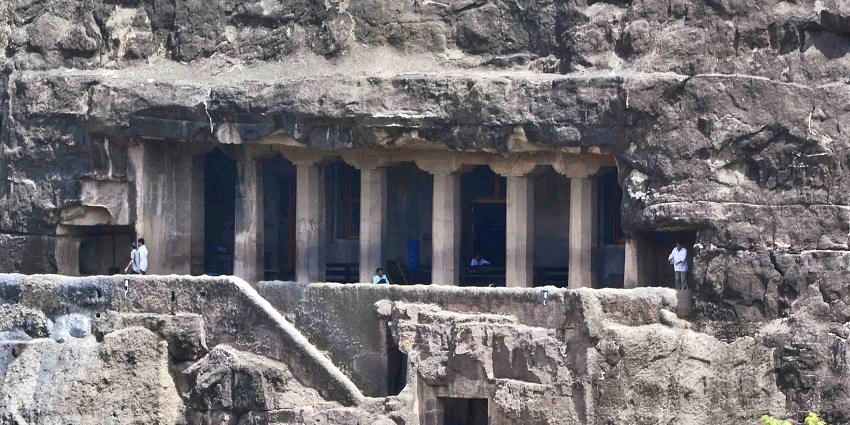 Ancient Ajanta Caves, showcasing intricate rock-cut Buddhist sculptures.