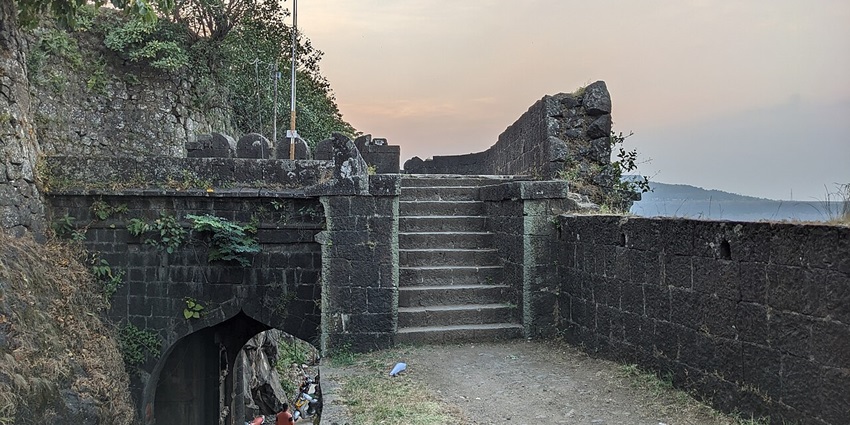 An image of historic Ajinkyatara Fort atop a hill, offering stunning panoramic views.