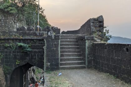 Ajinkyatara Fort, a famous fort near Maharashtra, perched on a hill with scenic surroundings.