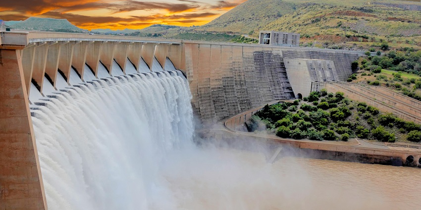 A glimpse of water flowing through the Akluj Dam, a tourist attraction in Maharashtra.
