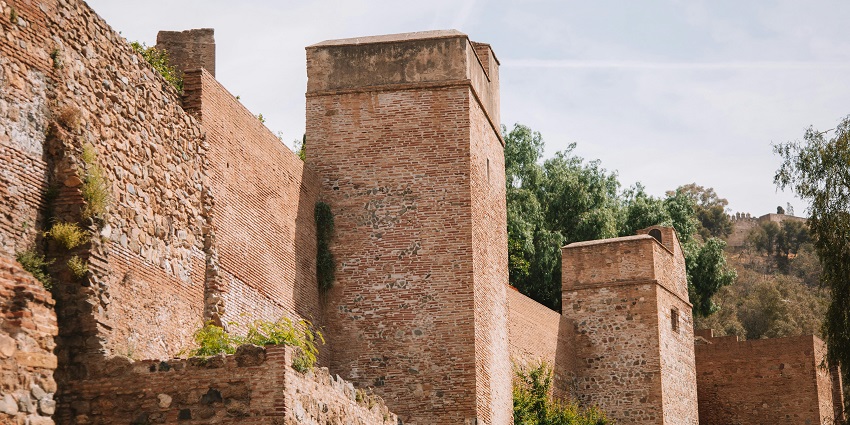 View of tall stone walls and ancient towers of a Fort, a must visit place for history lovers