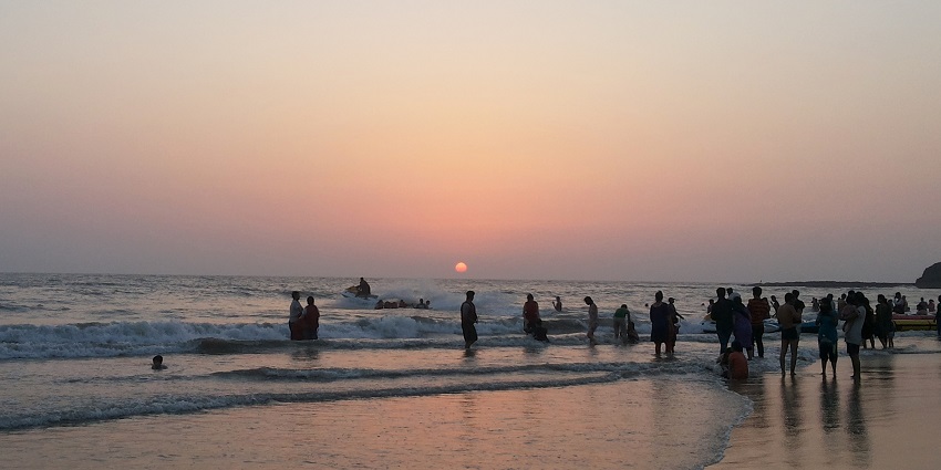 A serene sunset view over Alibaug beach, casting warm hues amidst hill stations near Mumbai to visit in May.