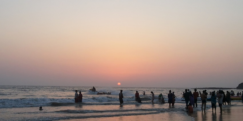 A serene sunset beach view in Alibaug, showcasing the beauty of the Konkan coastline.