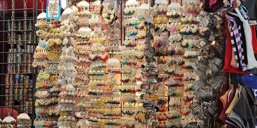 Pick up colourful trinkets for sale at the Alibaug Beach market while shopping in Alibaug