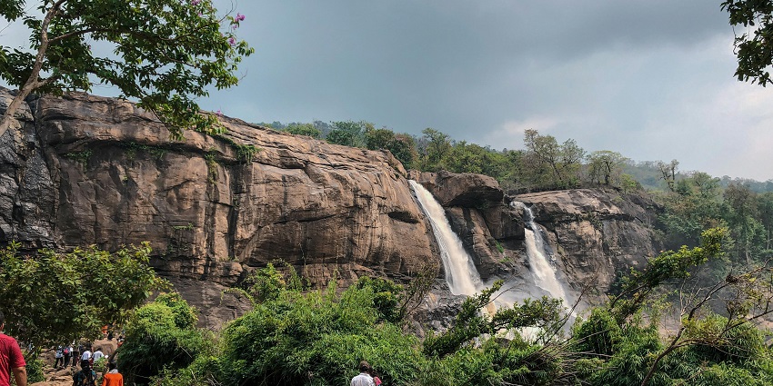 An image showing a waterfall with a flush of rapidly flowing water through the rocks.