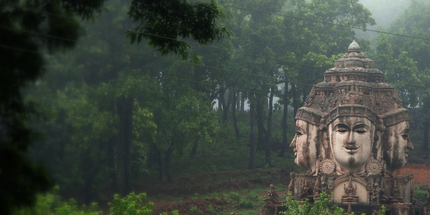 An image of Amarkantak featuring lush forests and temples