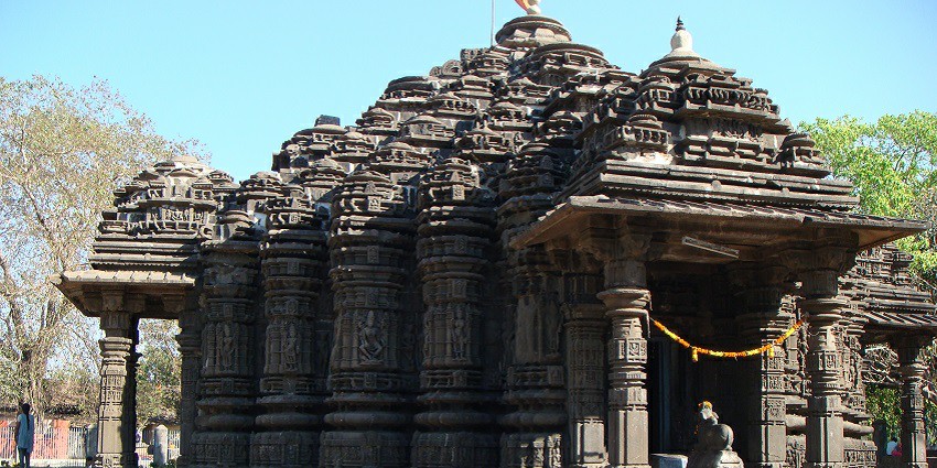 Ancient Shiva temple, the Hemadpanthi architecture with intricate stone carvings.