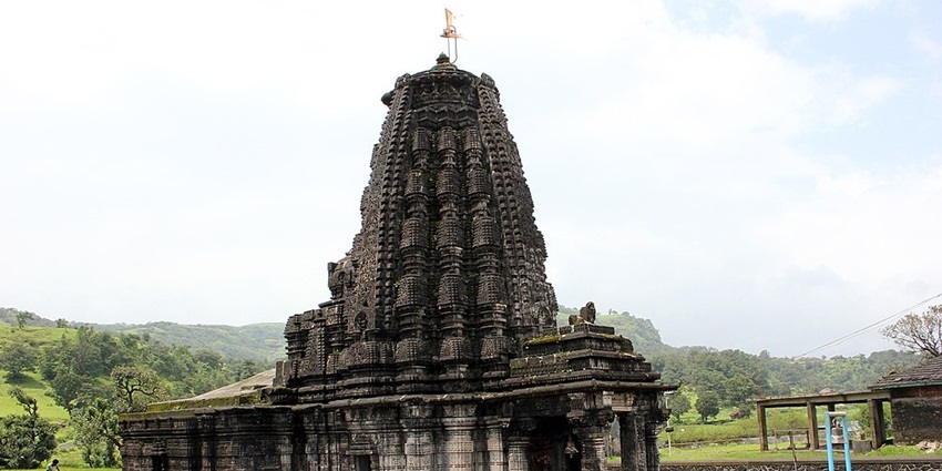 Amruteshwar Temple, featuring intricate architecture and beautiful surroundings.