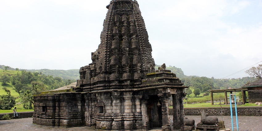 Majestic view of the Amruteshwar Temple surrounded by lush landscapes