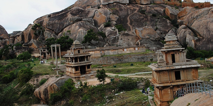 Ancient Chitradurga temple nestled in rocky terrain.