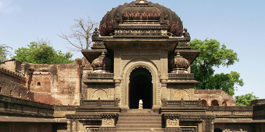 Stairs leading up to a traditional temple in Chennai, showcasing its carvings