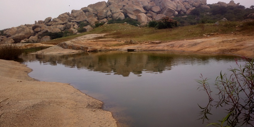River in Anthargange surrounded by rugged rocky landscapes