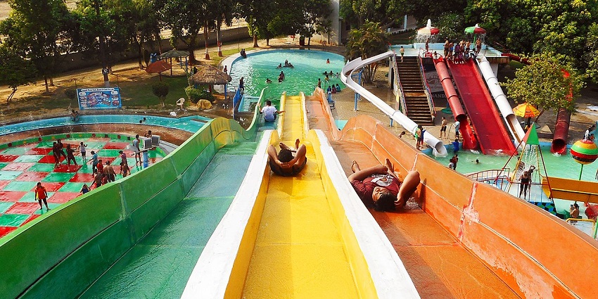 Visitors cooling off in pools at Aqua Fun World water park, a fun place in Meerut.
