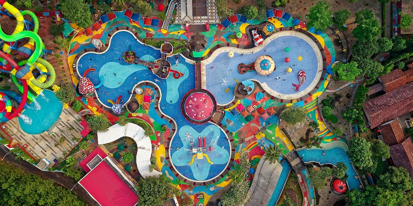 Aerial view of a water park with adventurous slides and rides - Aqua Marine Water Park